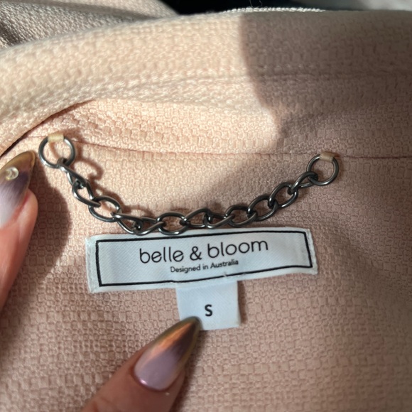 Textured Weave fitted silhouette and a timeless 'captain style' golden buttons. - Picture 2 of 3